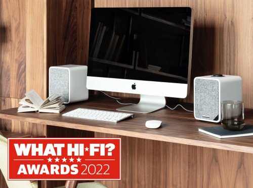 Ruark MR1 in Soft Grey finish shown on desk with computer